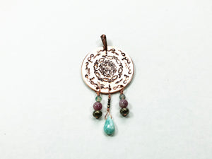 
            
                Load image into Gallery viewer, Uplifting Copper Mandala Pendant
            
        