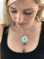 Uplifting Silver Mandala Pendant